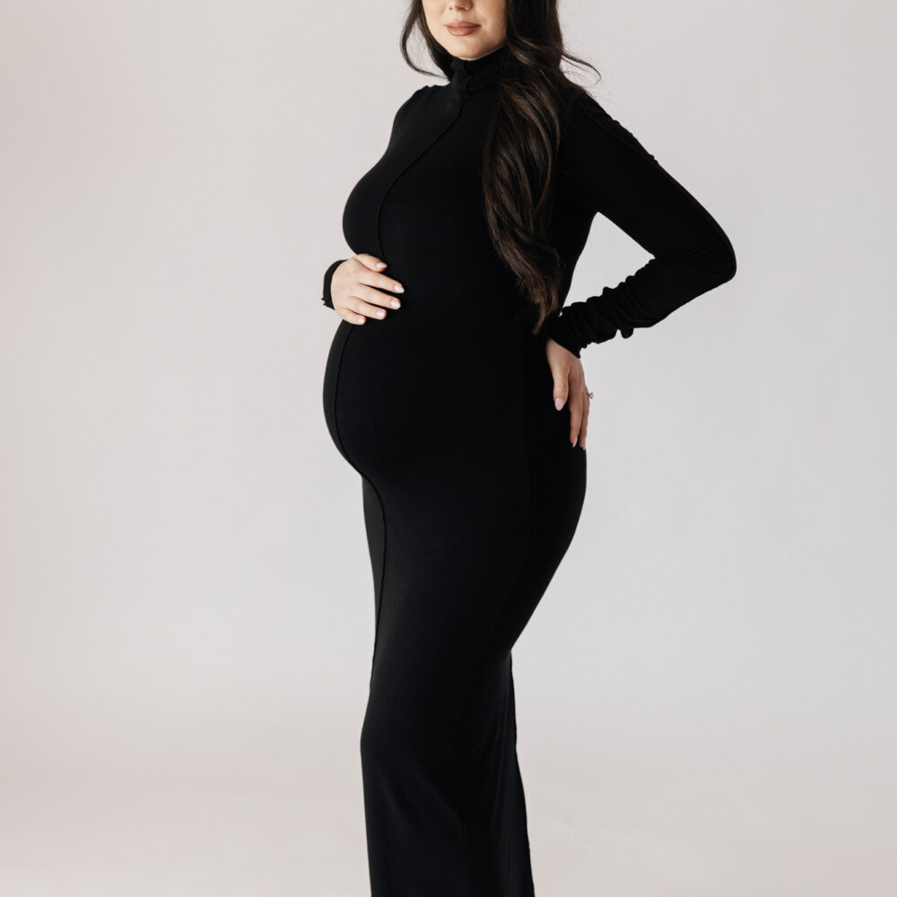 pregnant woman in black gown side profile, studio maternity photographer Perth