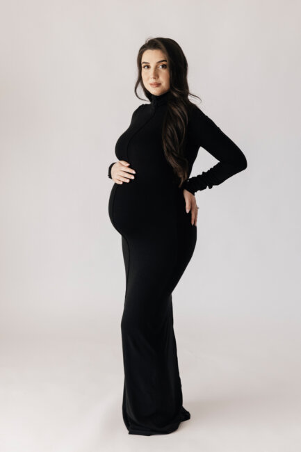 pregnant woman in black gown side profile, studio maternity photographer Perth