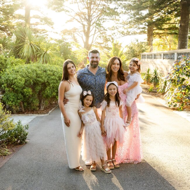 family photography Perth - family of six with four daughters in pink dresses at golden hour