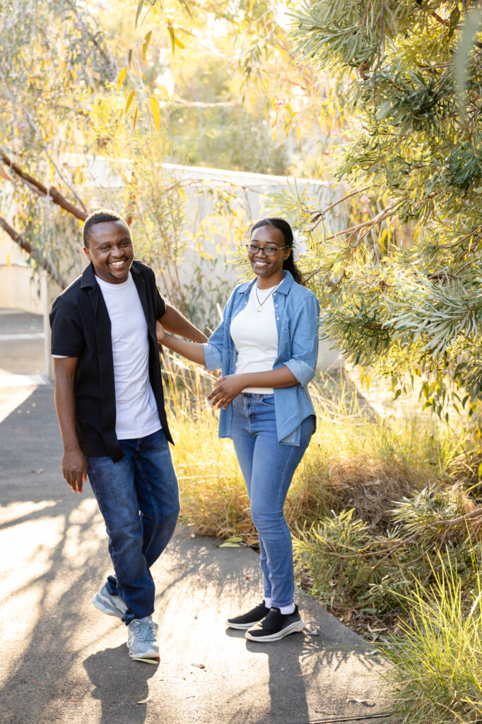 Mum and dad walking and laughing, couples portrait Perth family photography